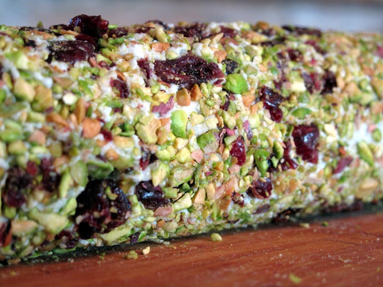 Cheese log rolled in nuts