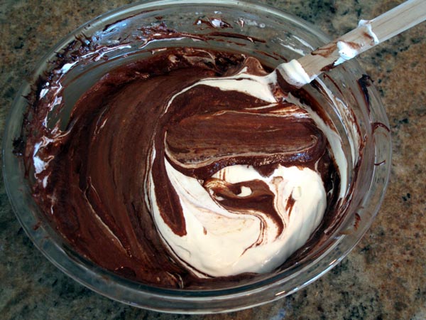 Dark chocolate mousse folding
