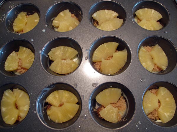 Pineapple Upside Down Muffins slices on brown sugar