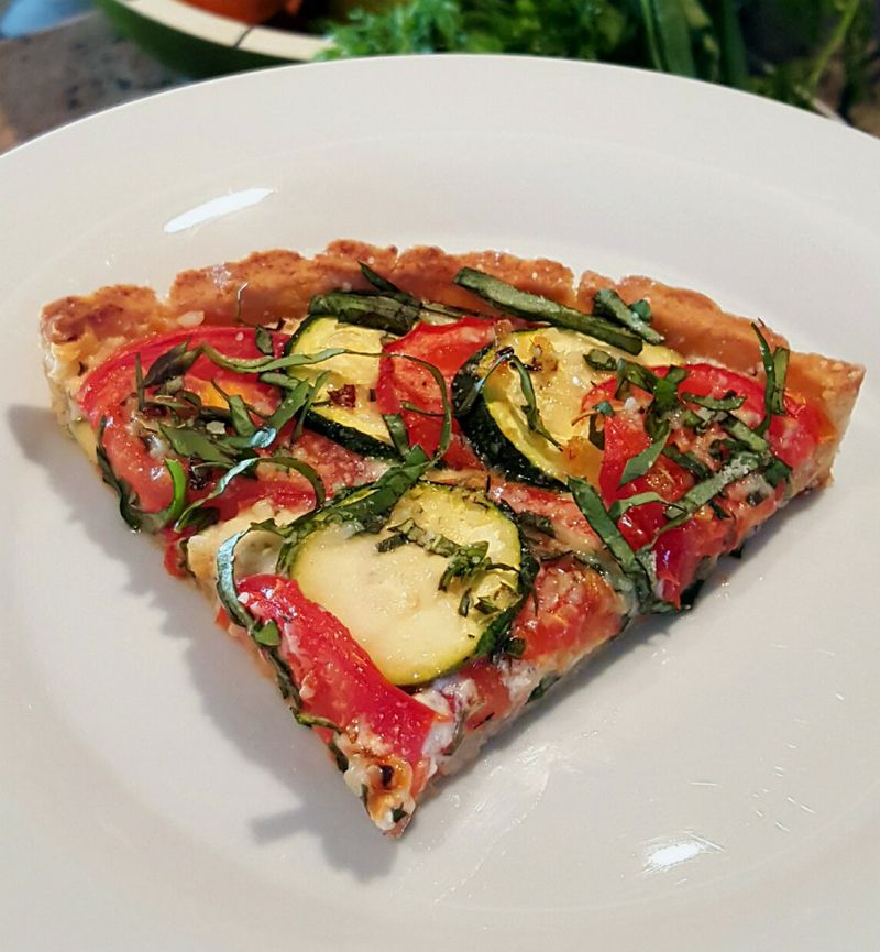 Tomato zucchini tart slice