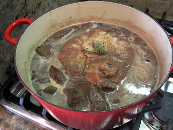 Beef cooking with bouquet garni
